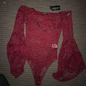 red lace body suit flare sleeves